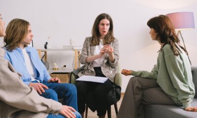 Psychotherapist giving advice to a group of patients